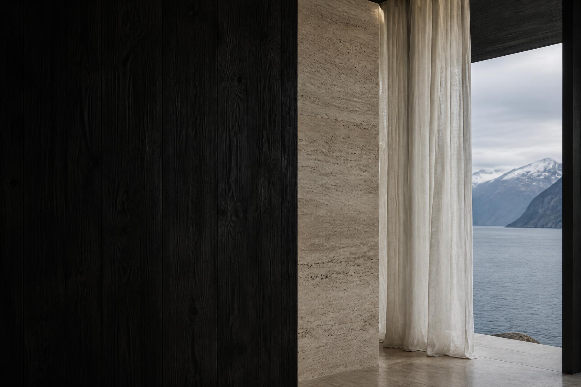 Refined coastal architecture overlooking a Norwegian fjord